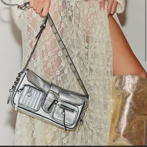 NWT free people Silver metallic leather Bag with adjustable straps